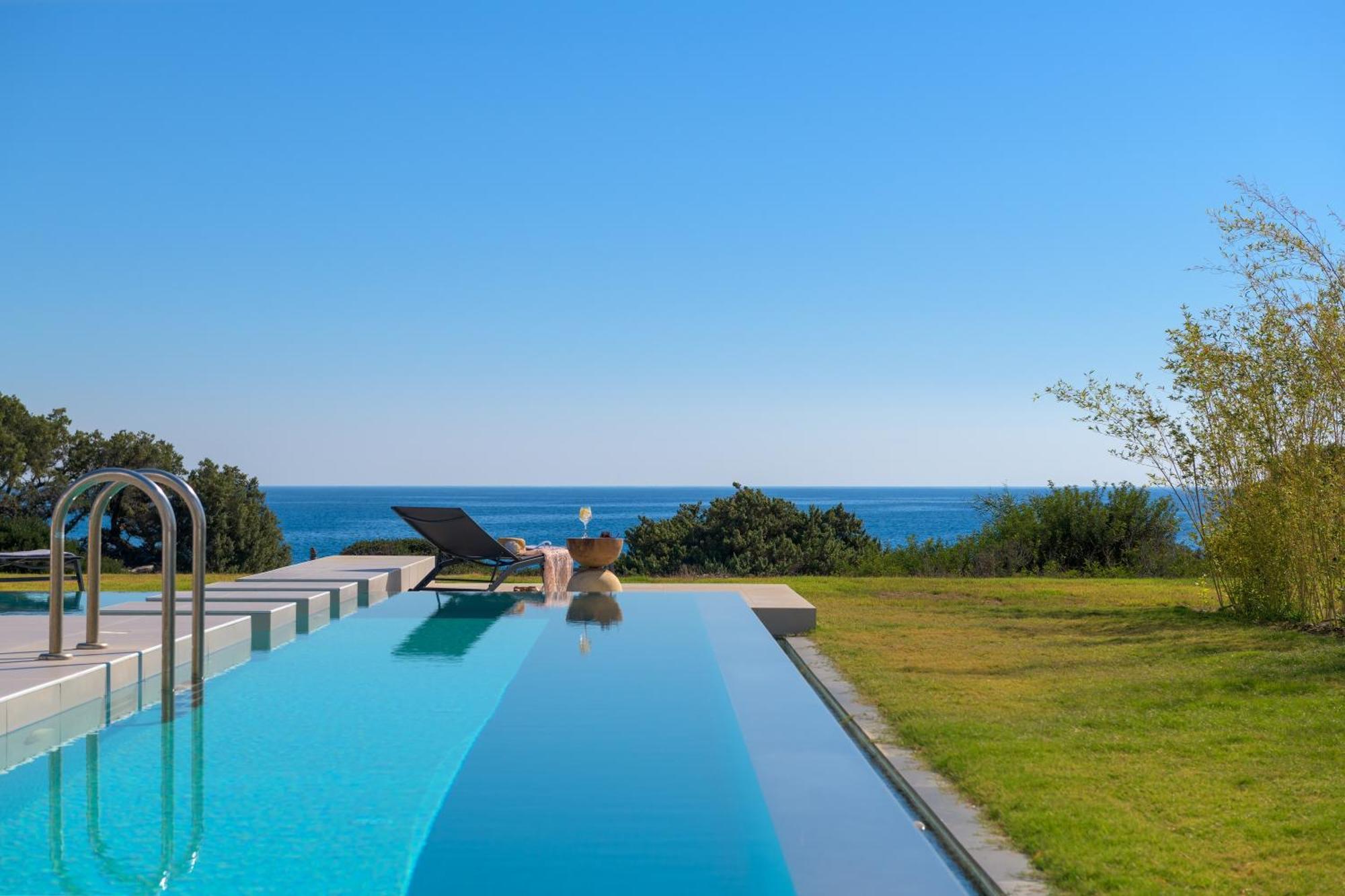 Albatross Beach Front Villas Jenádi Kültér fotó