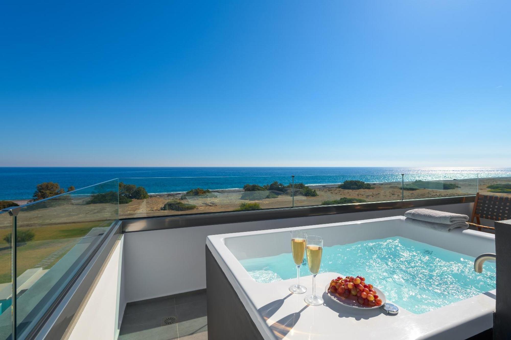 Albatross Beach Front Villas Jenádi Kültér fotó