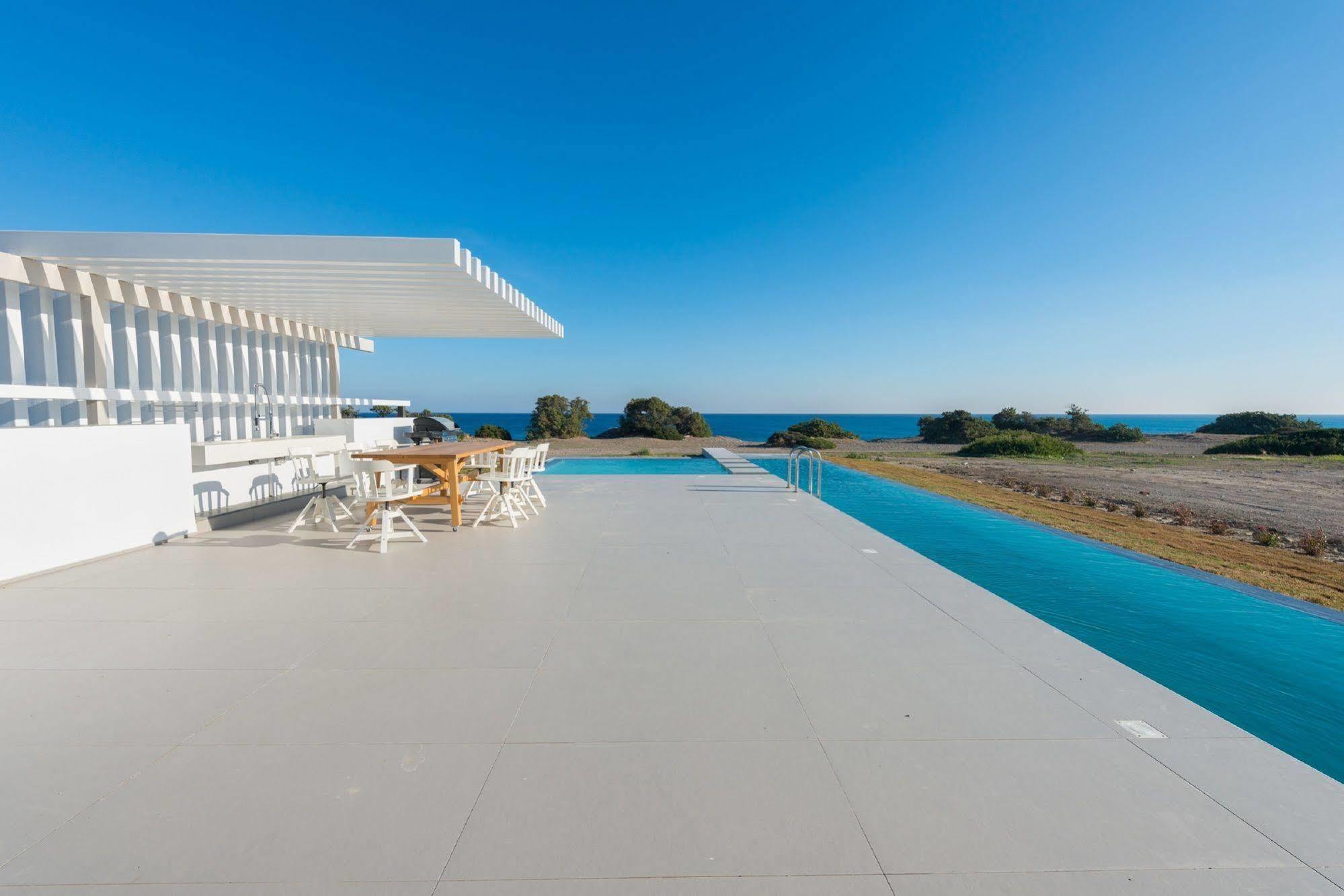 Albatross Beach Front Villas Jenádi Kültér fotó