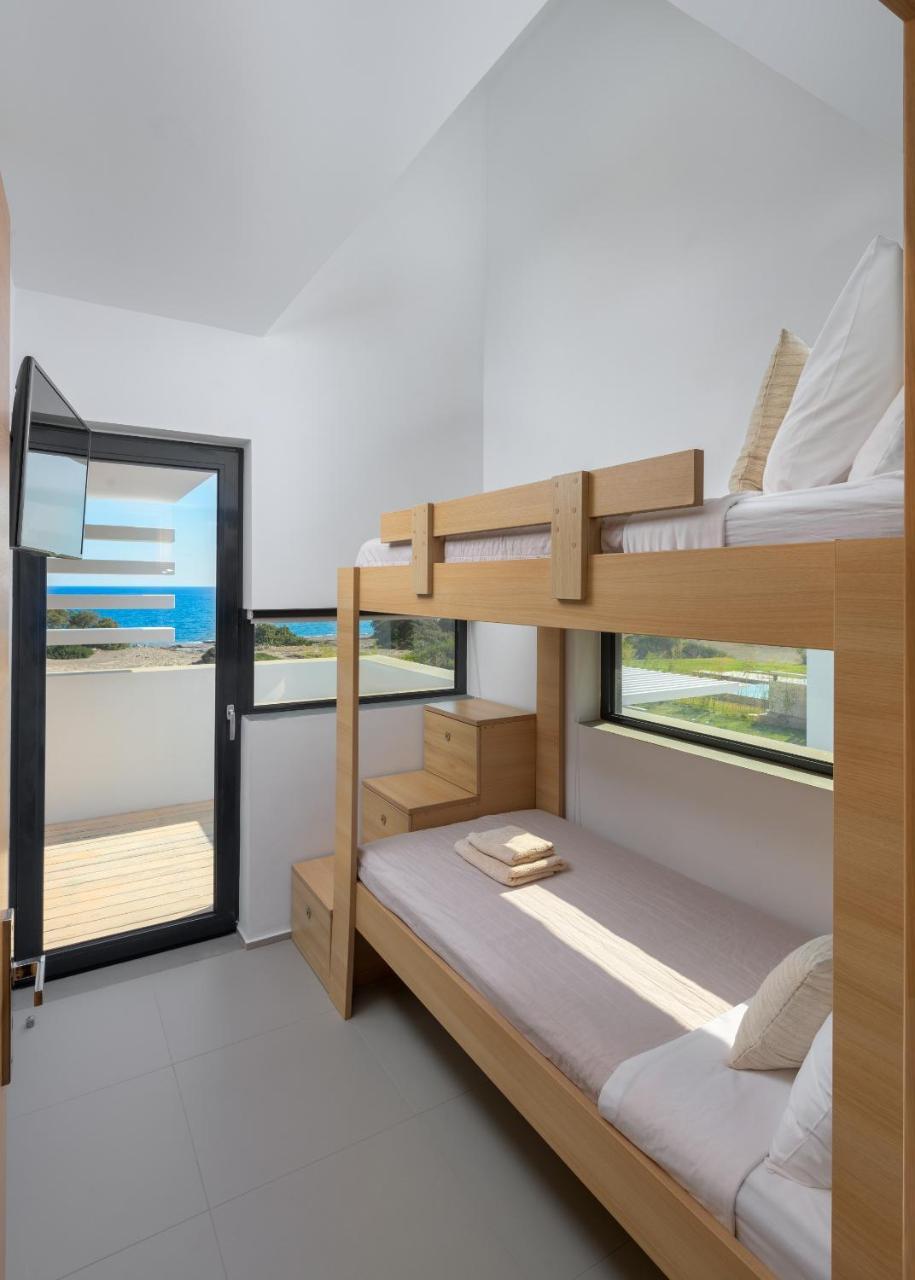 Albatross Beach Front Villas Jenádi Kültér fotó