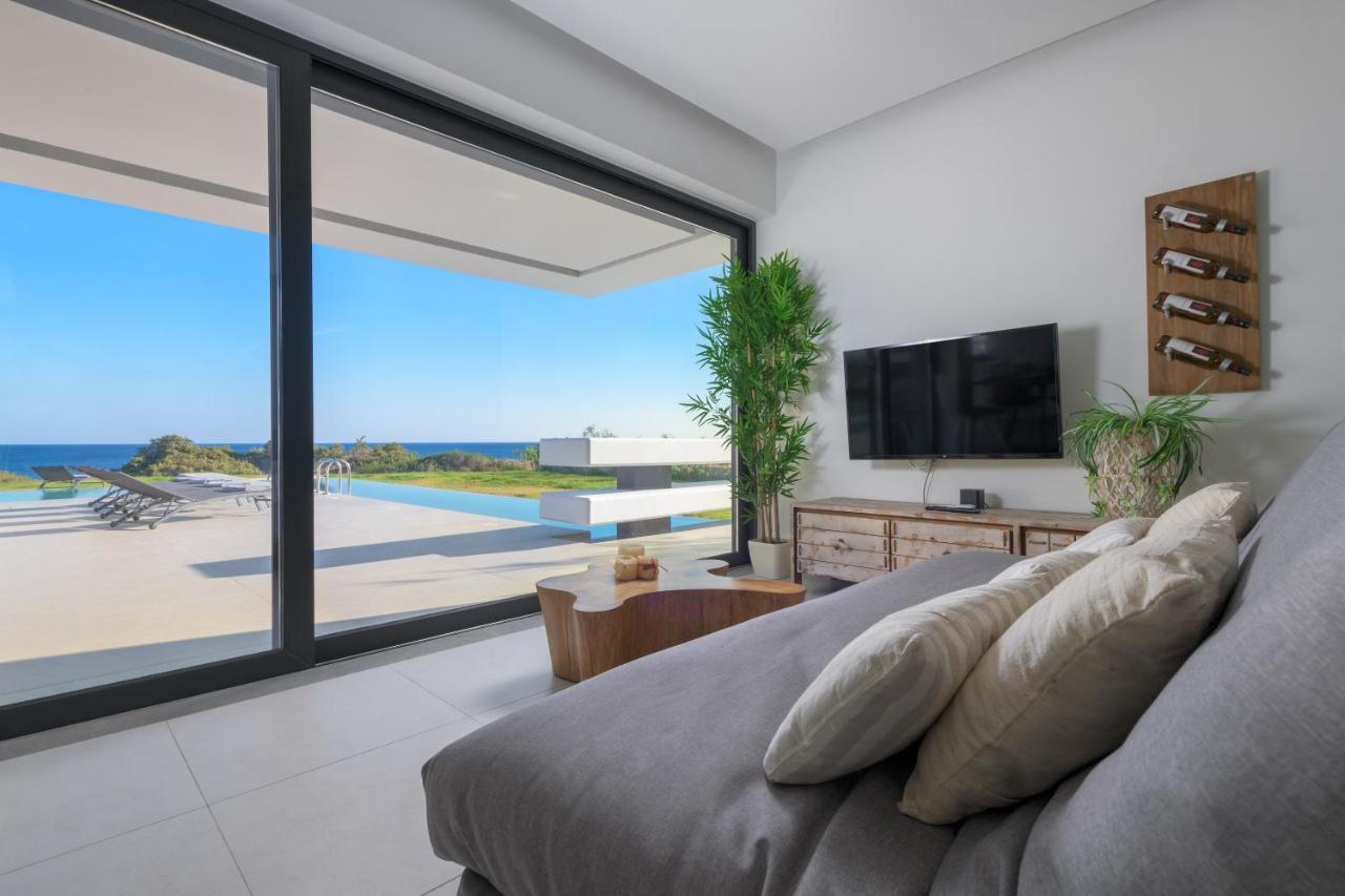 Albatross Beach Front Villas Jenádi Kültér fotó