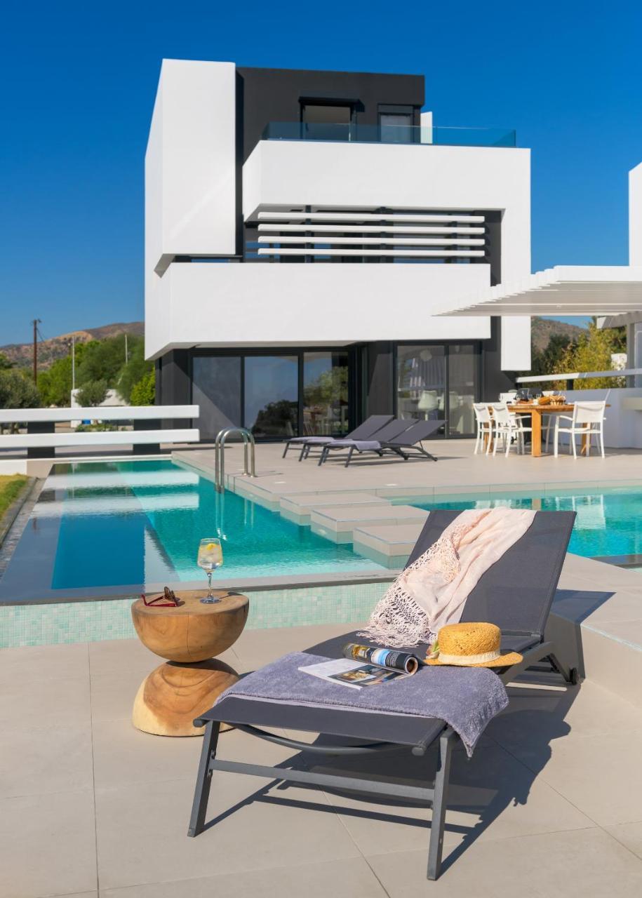 Albatross Beach Front Villas Jenádi Kültér fotó