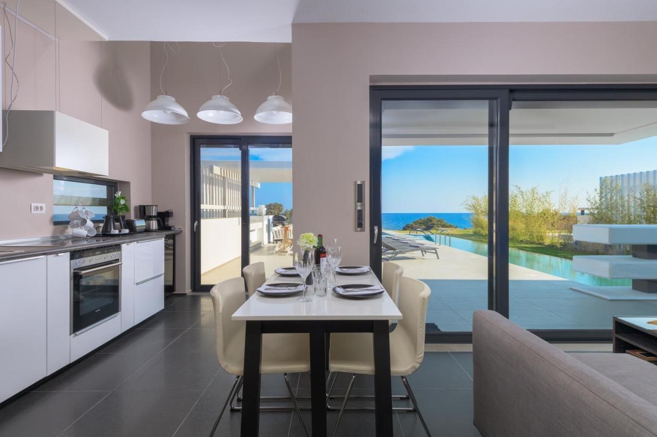 Albatross Beach Front Villas Jenádi Kültér fotó