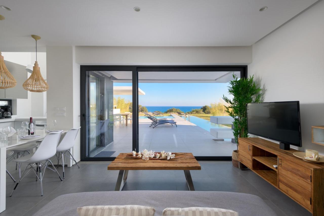 Albatross Beach Front Villas Jenádi Kültér fotó